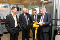 Photo of users seeing new Radio Frequency Identification technology being demonstrated